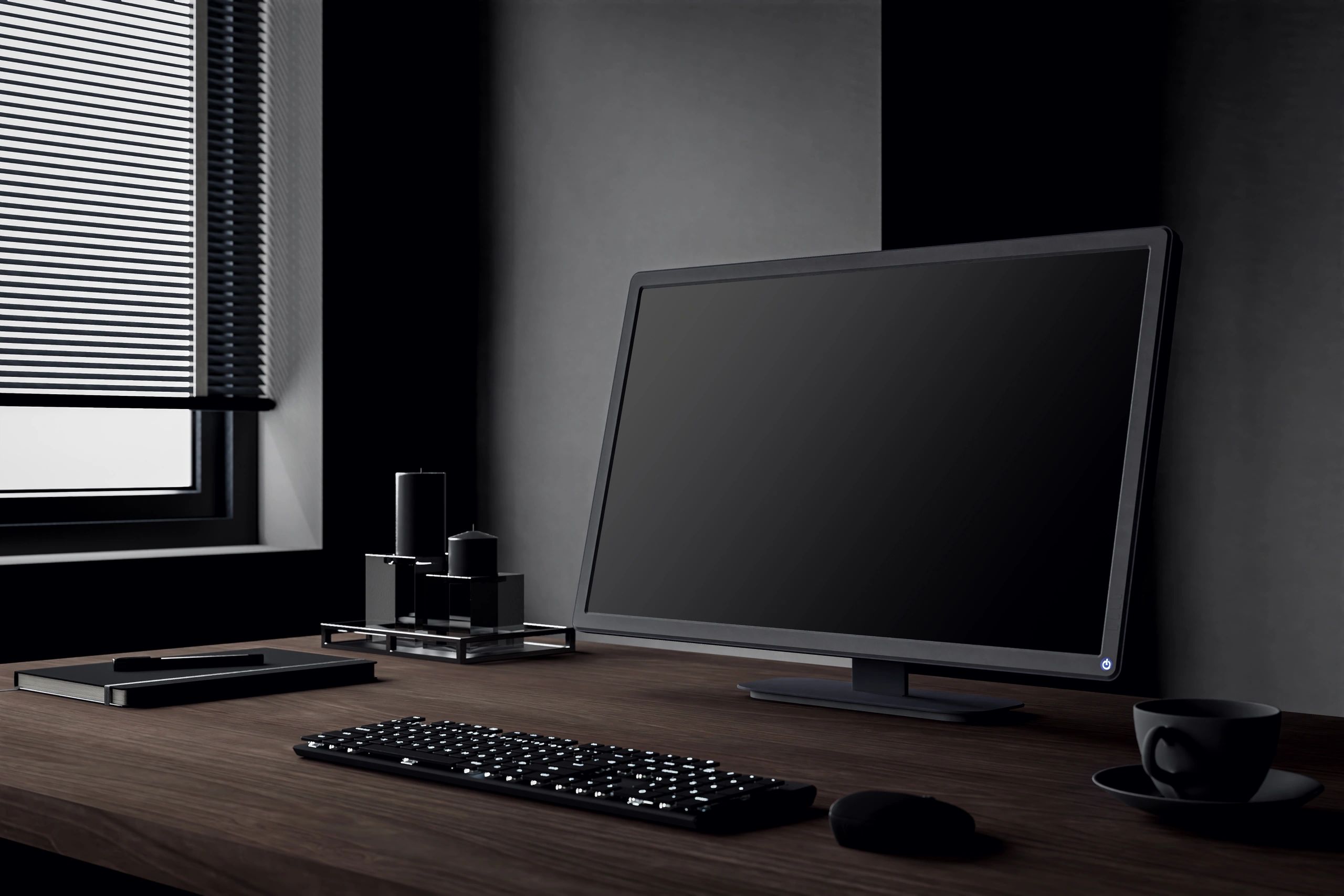 Minimal dark workspace with desktop computer