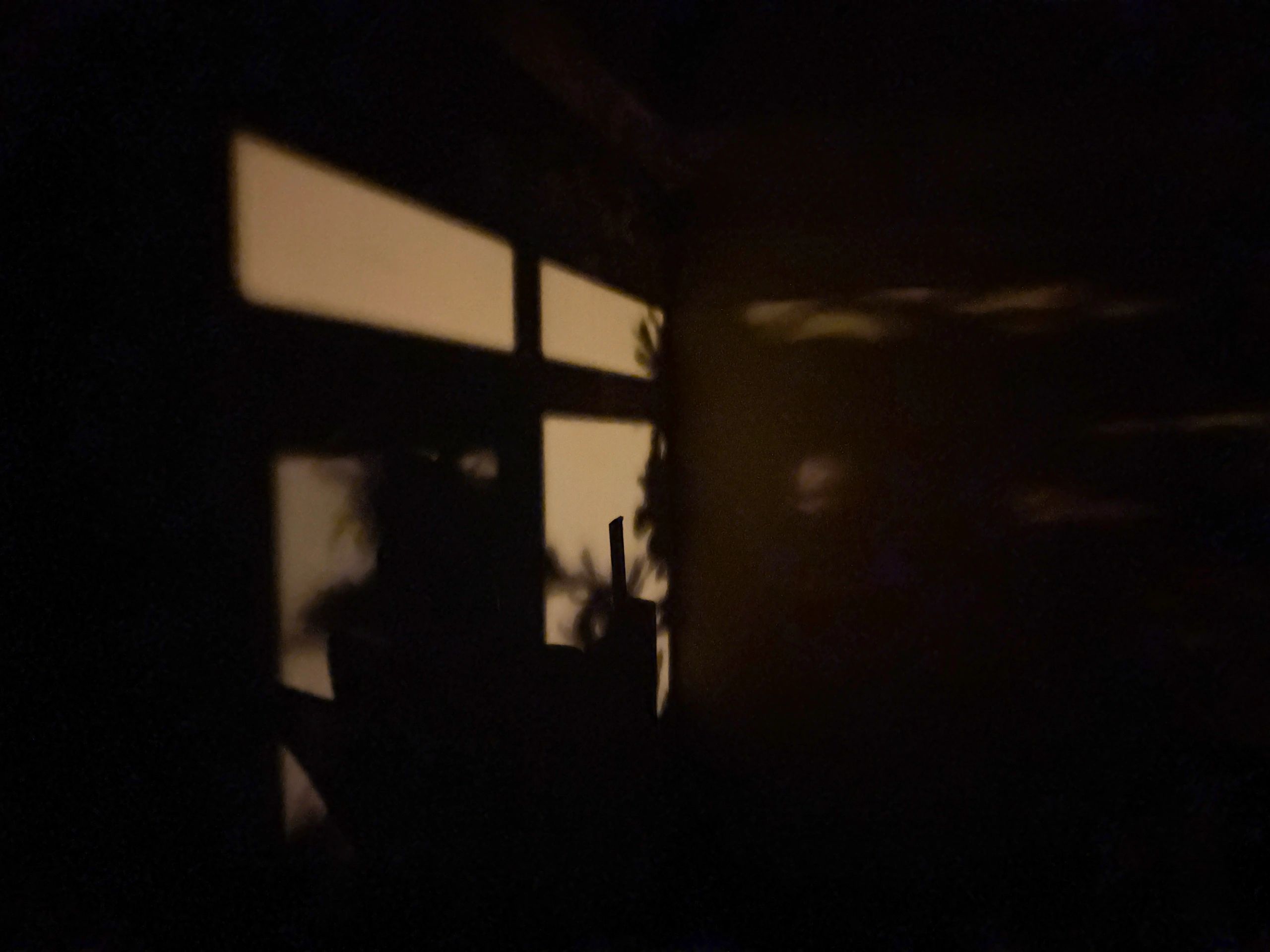 Moody interior wall with window shadow