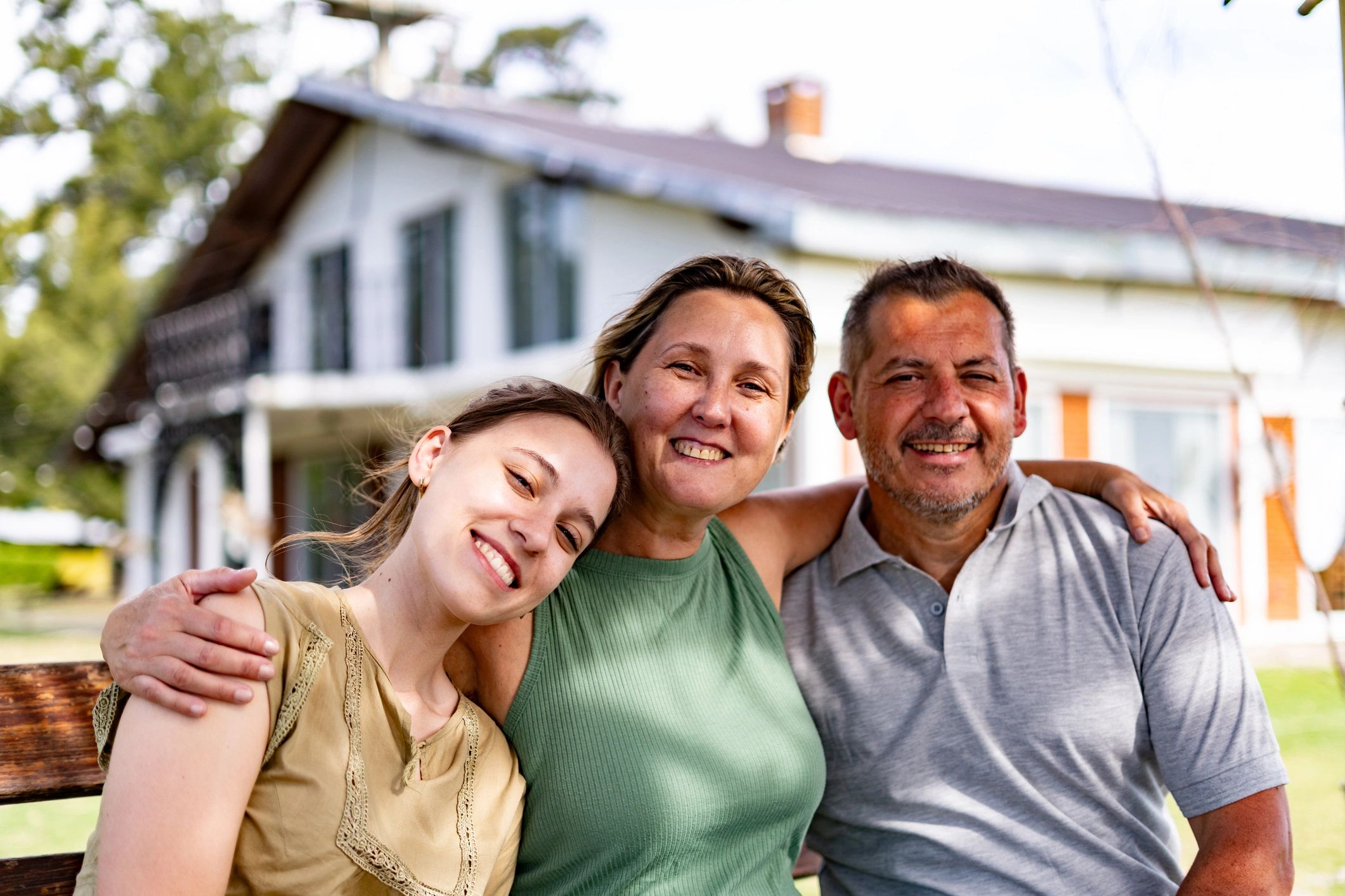 Family portrait outdoors representing shared history and belonging